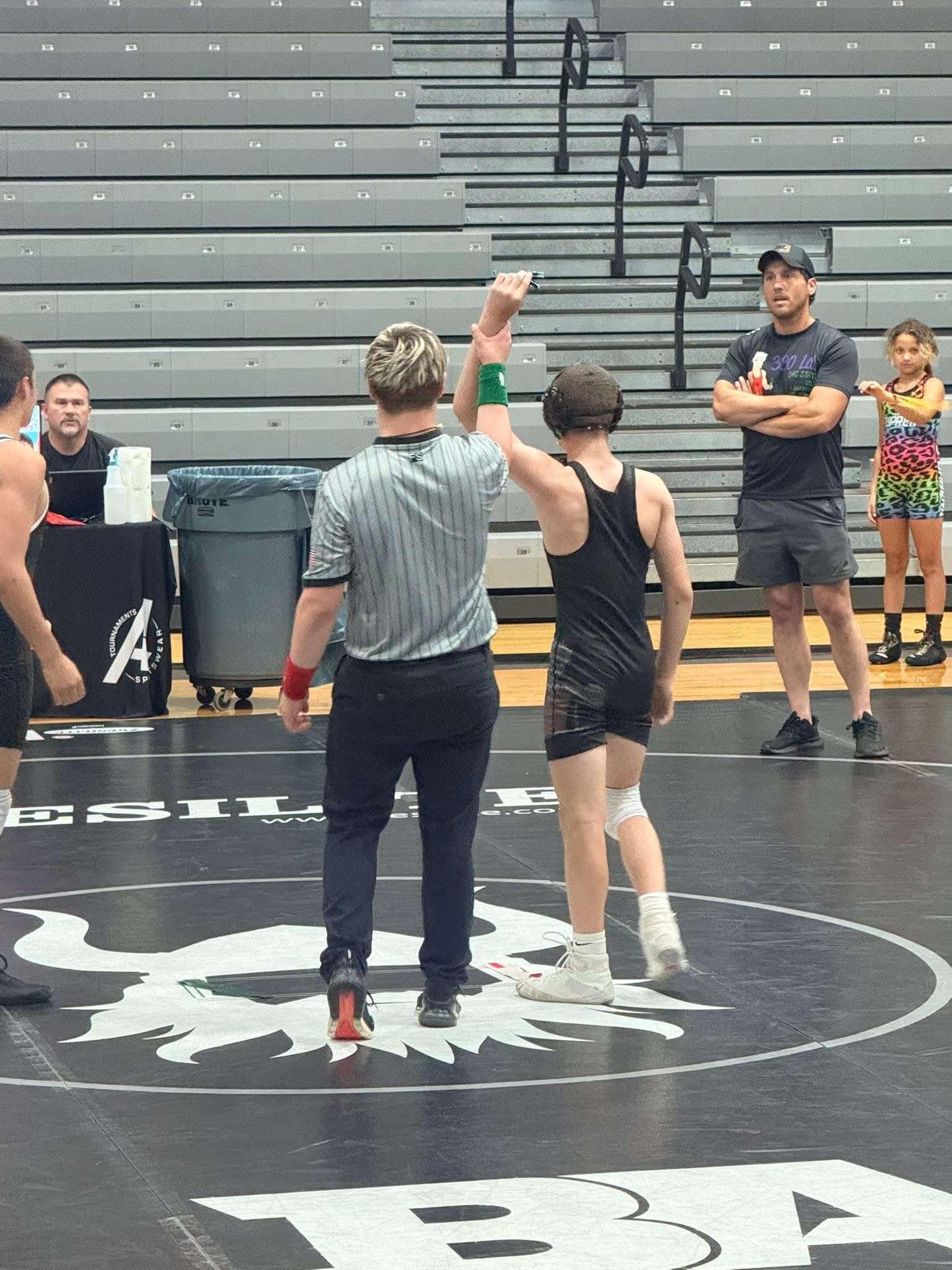 Nathan Beachy after having his hand raised on the wrestling mat