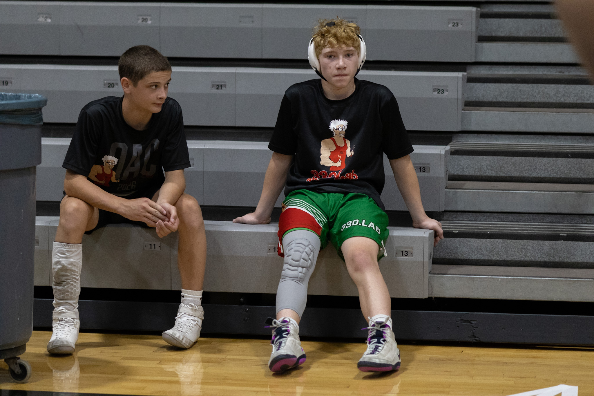 Nathan Beachy seated with a teammate between matches